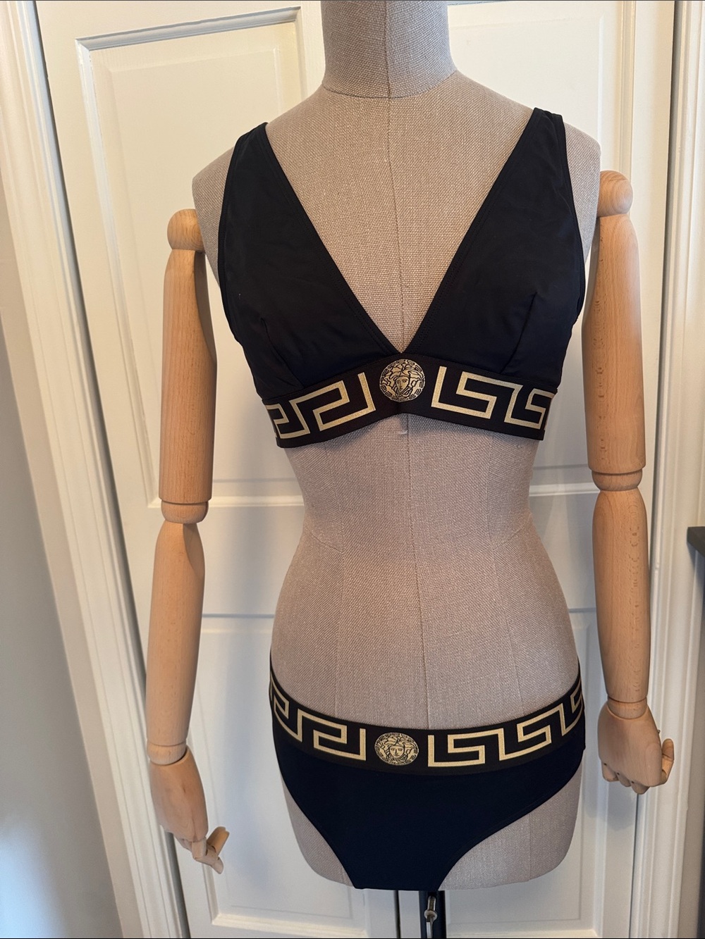Versace Black and Gold Bikini Top with Medallion Accent